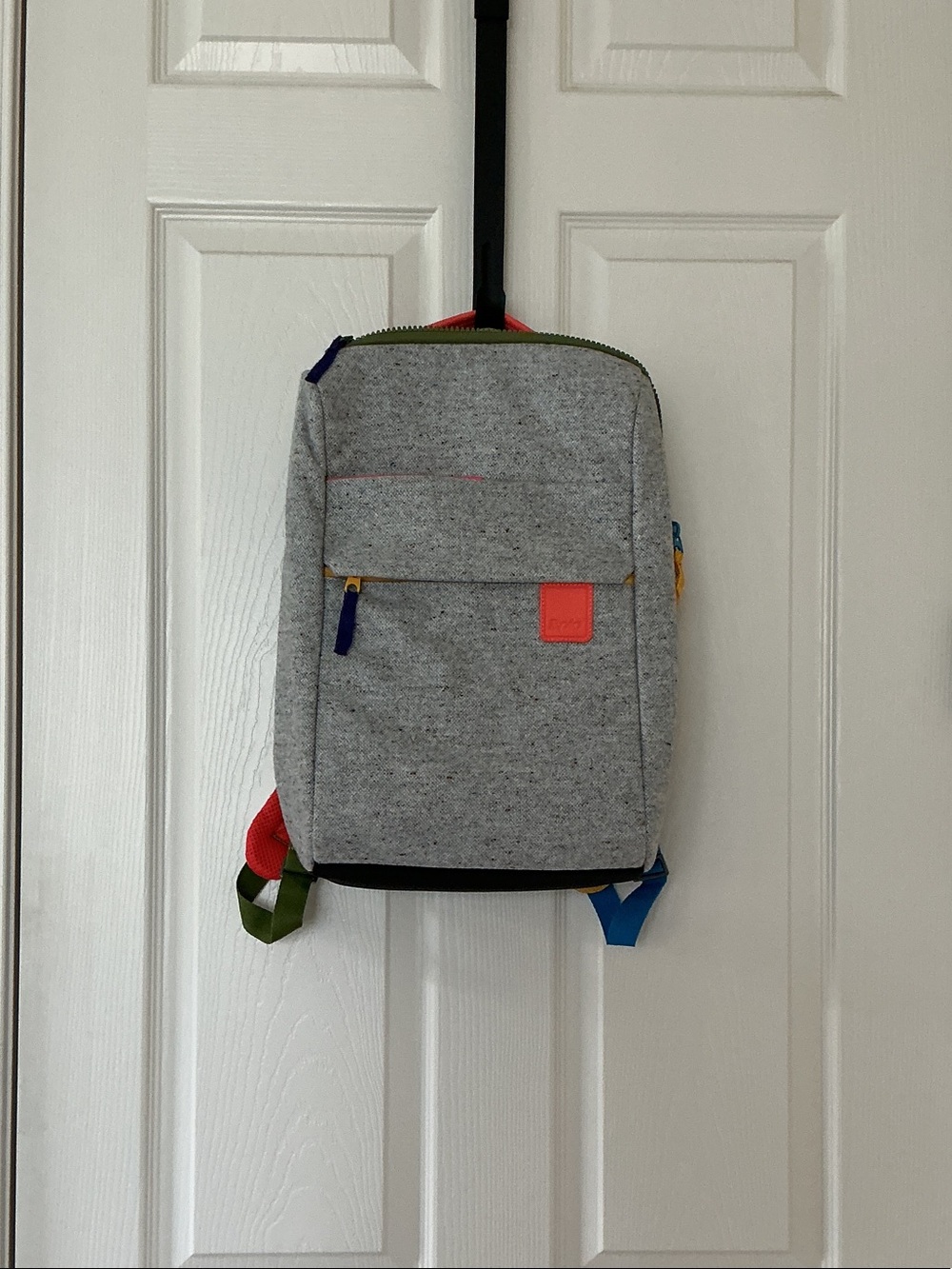 Casual Grey Backpack with Colorful Accent Zippers